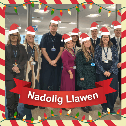 The HWW team with Christmas hats. The image has a banner that says 'Nadolig Llawen'
